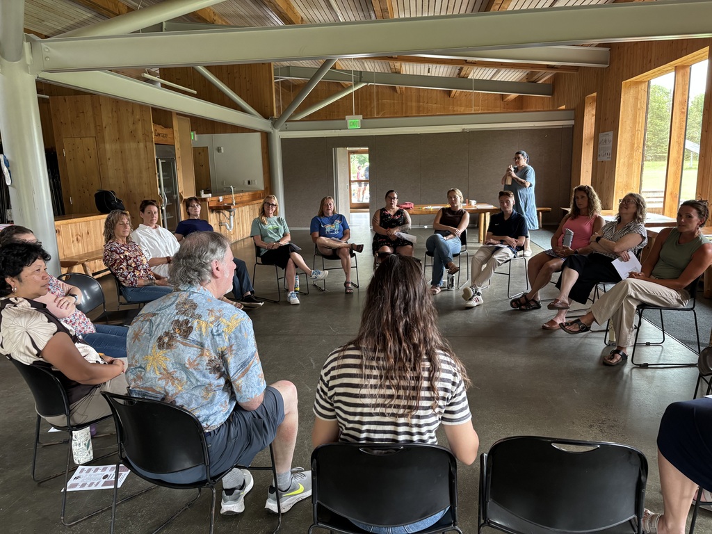 Staff sitting in a circle 
