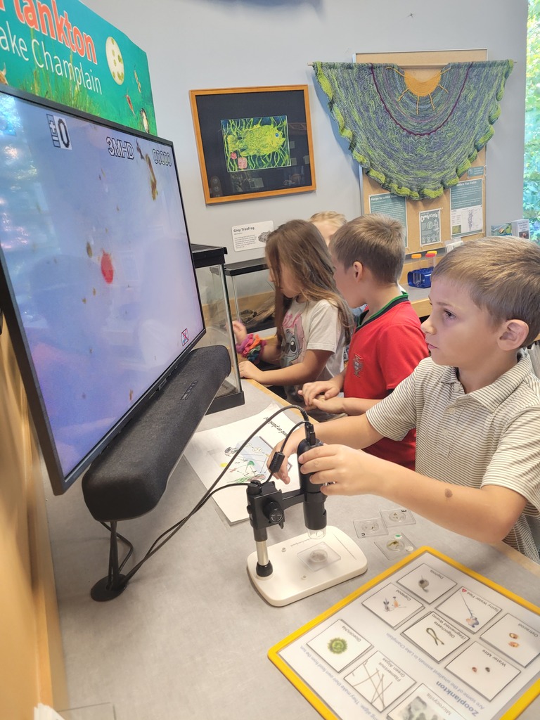 students at an exhibit in the echo center