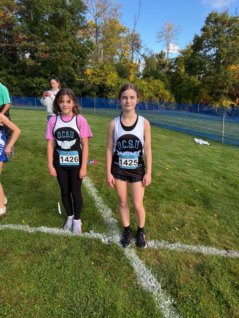Two students pose after the race