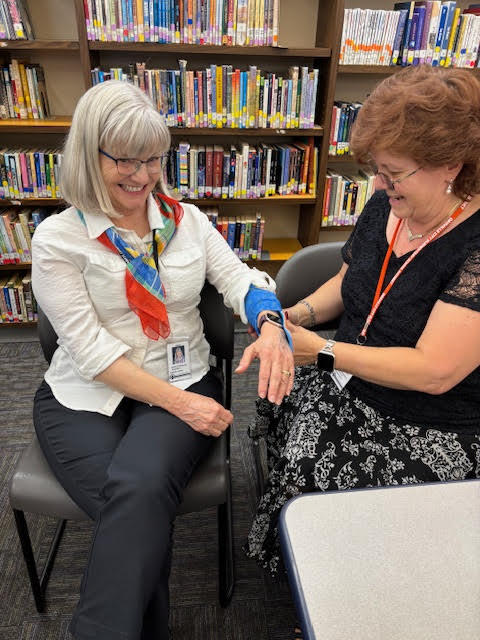 Staff practicing splinting arms