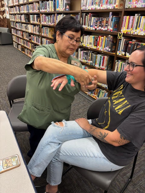 Staff practicing splinting arms