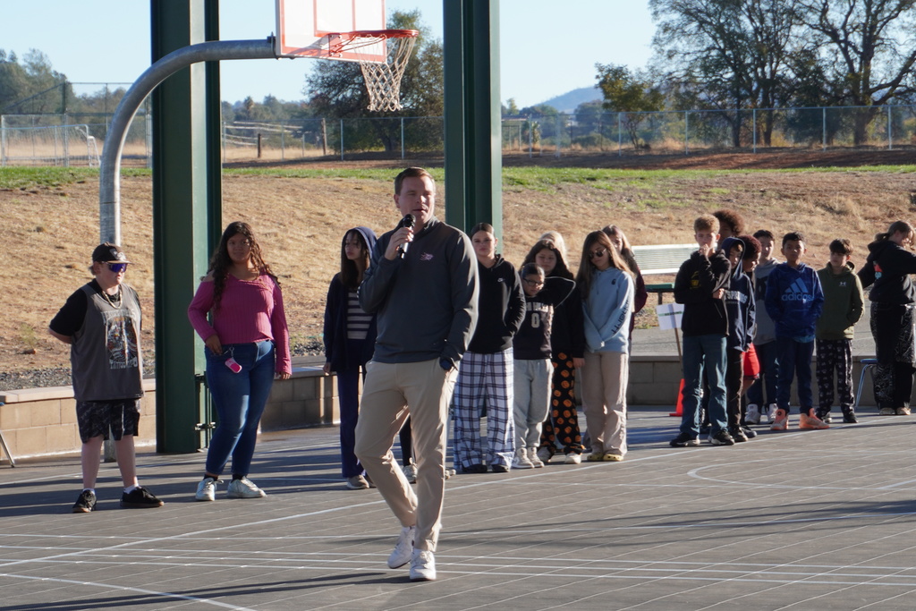 Chico State Mens coach talking to the students