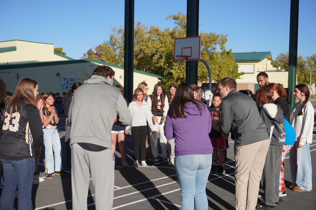 Ishi Hills Basketball team having a pep talk