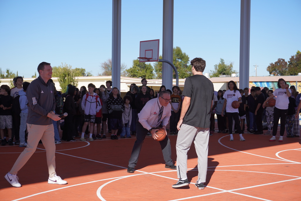 Dr. Holtom about to cross over Chico States Team member