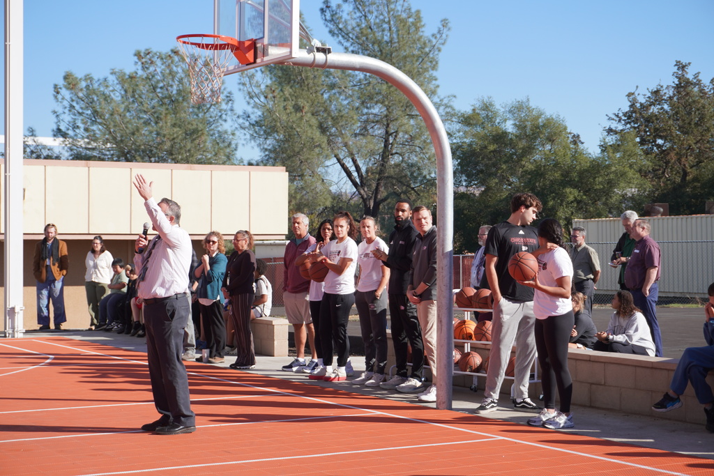 Dr. Holtom talking to students