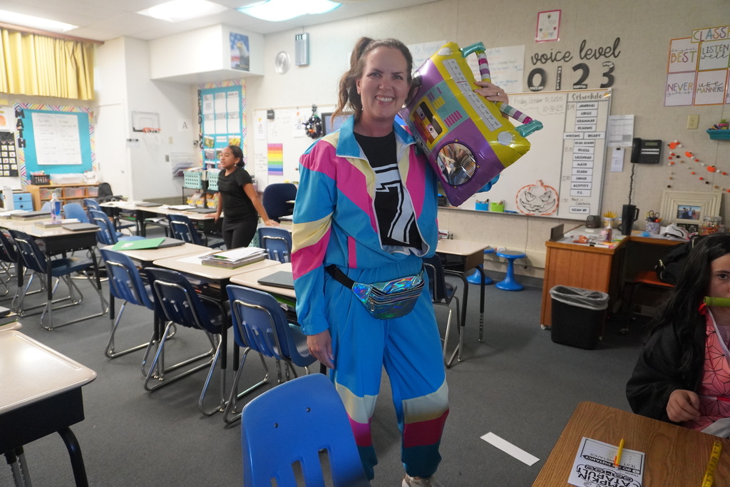 Oakdale Teacher dressed up in 80's costume