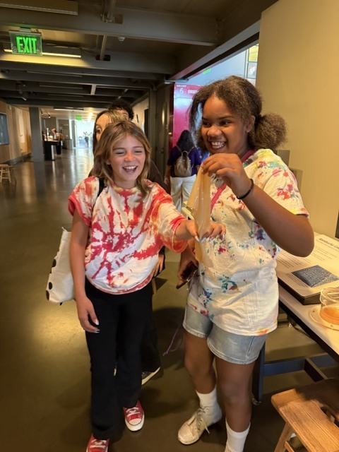Students playing with fermented cabbage