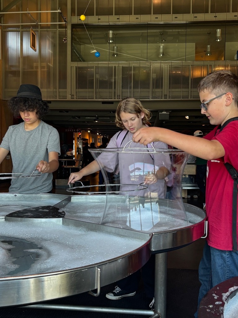 Students playing with bubbles