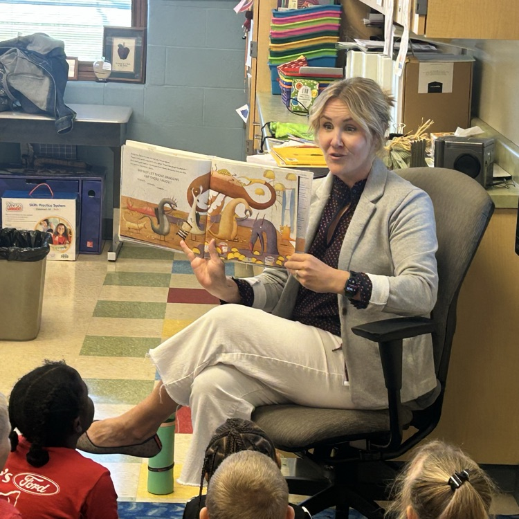 Mrs. Crooks doing a little reading to a class today.