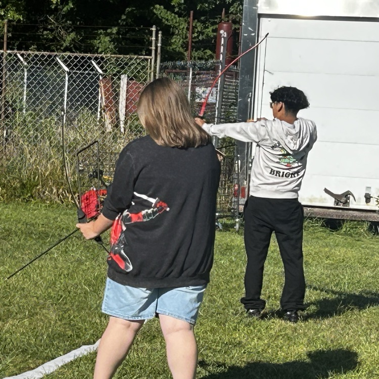 Mr. Keeney teaching archery today in PE!