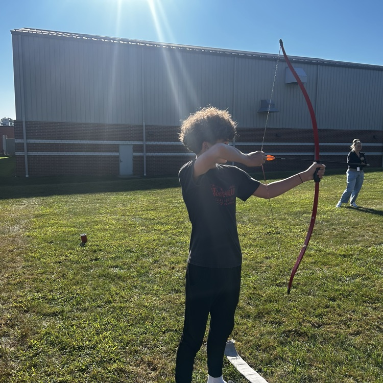 Mr. Keeney teaching archery today in PE!