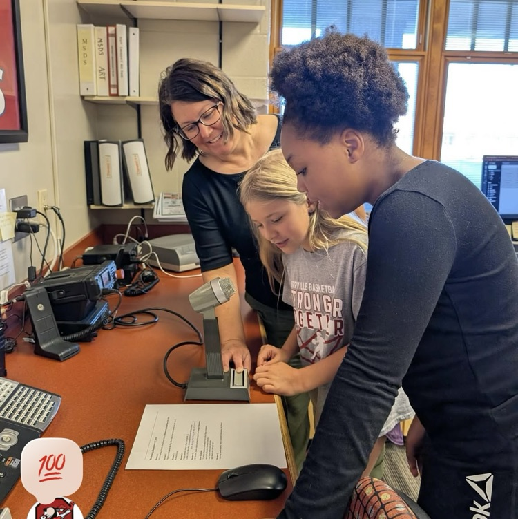 The awesome Mrs. Wallace and our 4th grade students doing some announcemets!