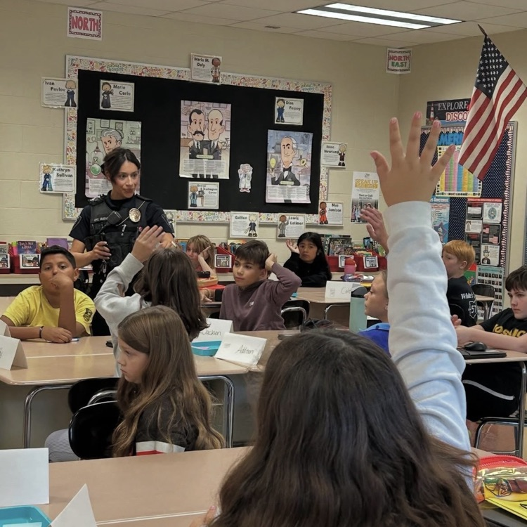 Officer Bueno delivering Anti-Bullying info to 5th graders.