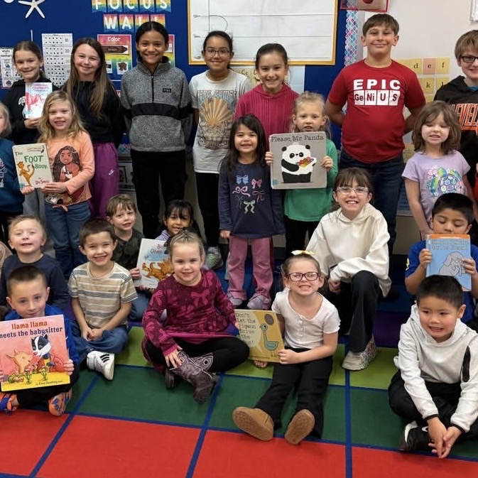 4th grade student council members reading to our preschoolers!