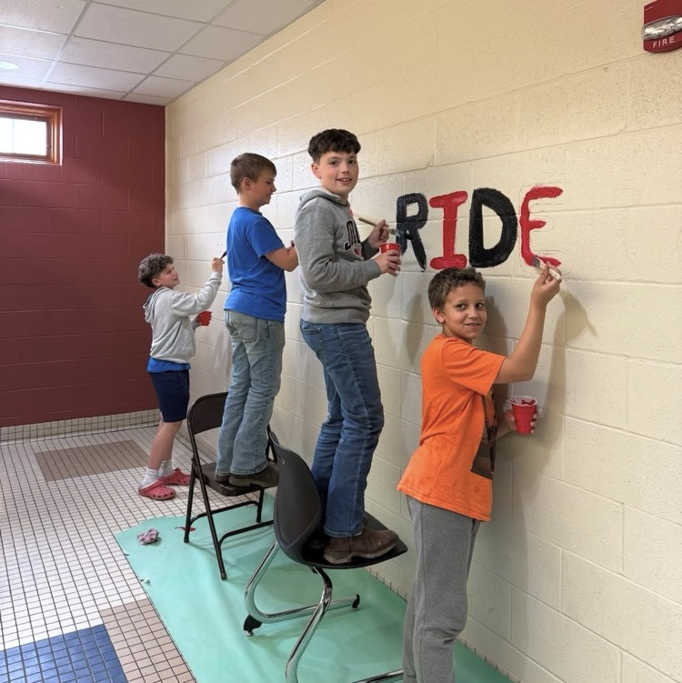 OMS Kindness Club spreading some good vibes around the school! #redridernation