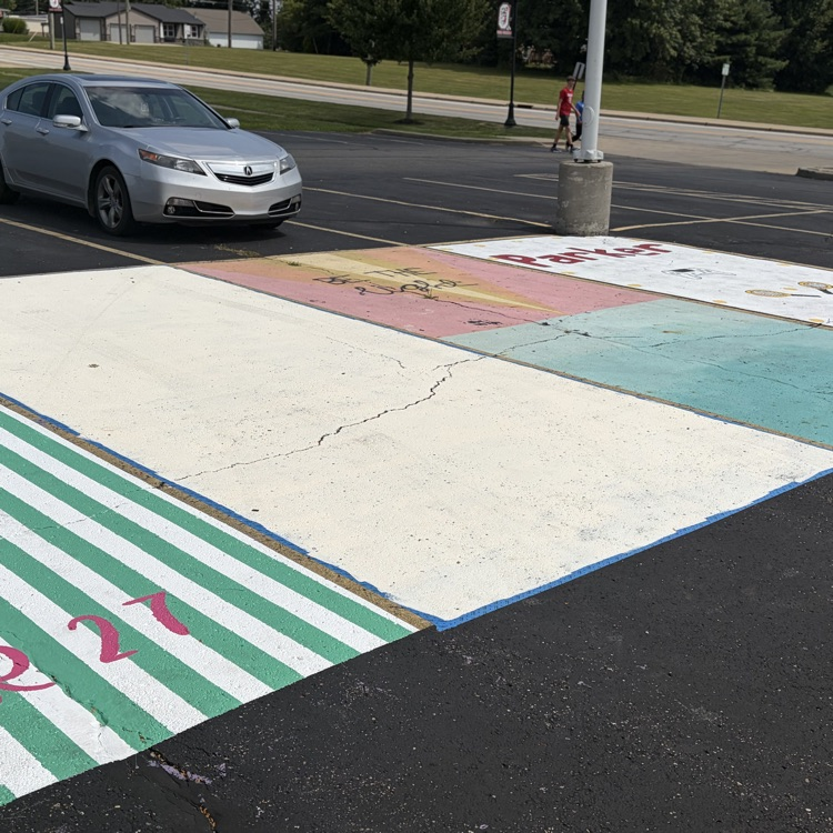 Checking out some great parking lot art courtesy of the class of 27!