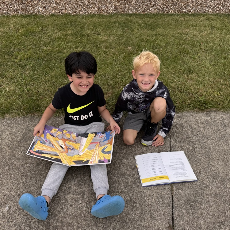 Reading fun outside at OES! #everykid #redridernation