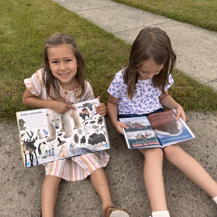Reading fun outside at OES! #everykid #redridernation