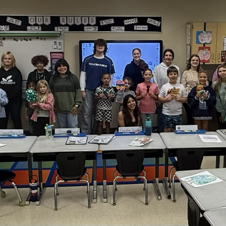 Mrs. Besancon & her high school class helping our second graders with making monsters! 🧌