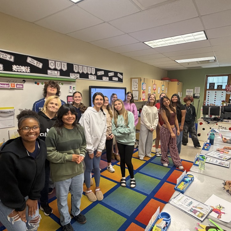 Mrs. Besancon & her high school class helping our second graders with making monsters