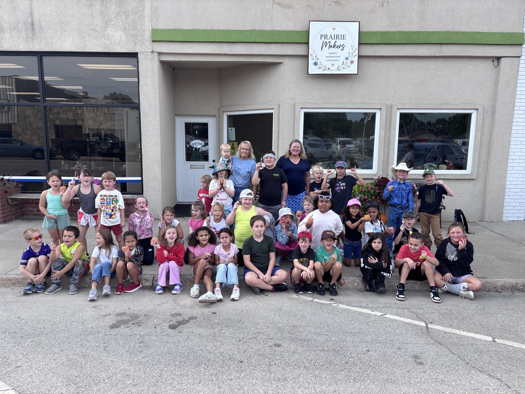 2nd Graders outside Osage City Garden and Produce