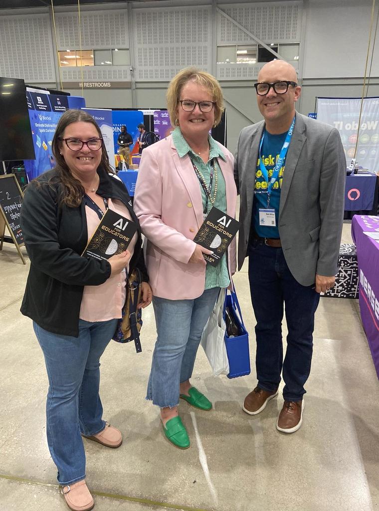 Teachers pose for a photo with Matt Miller.