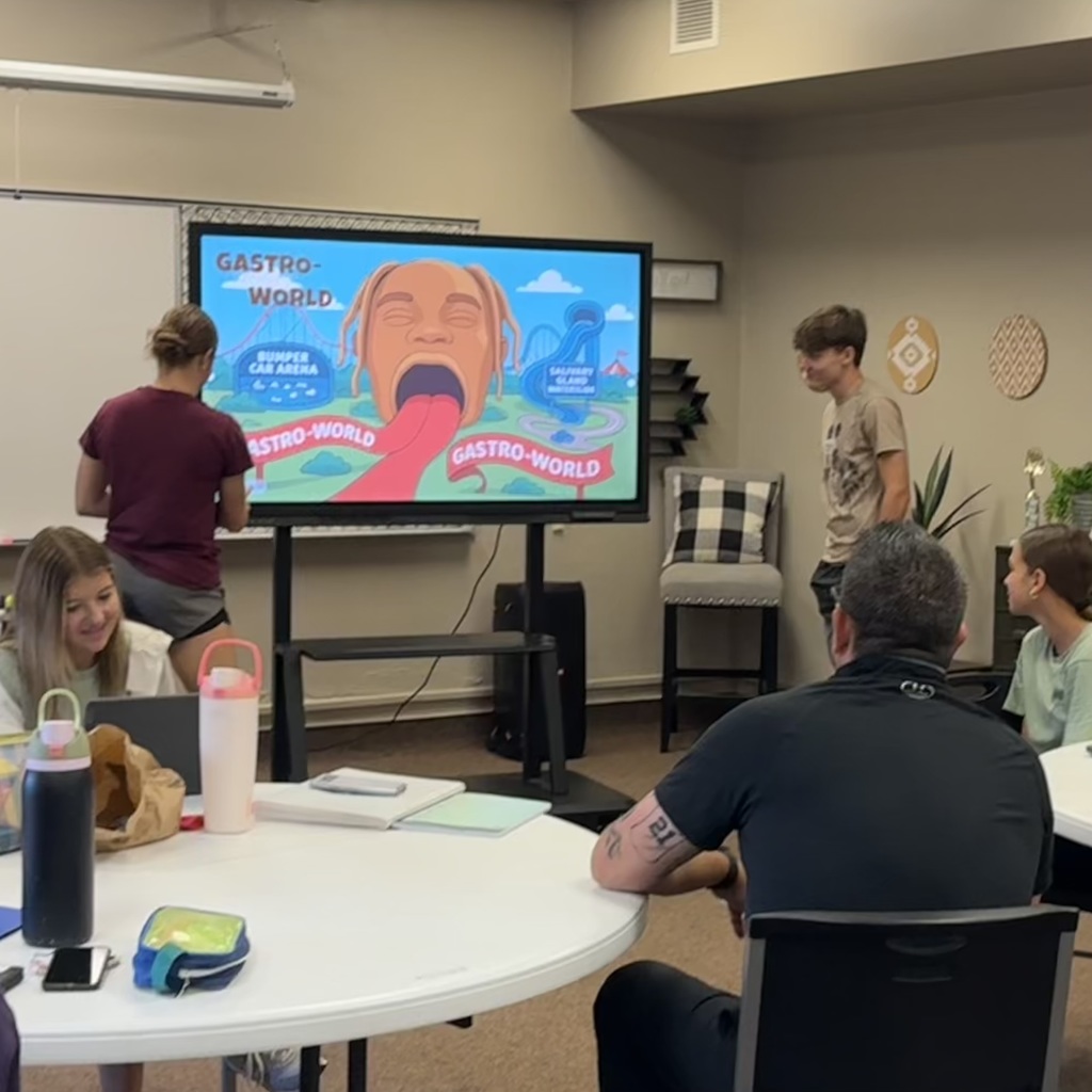Ms. Cook's Nutrition & Wellness class presented creative theme park designs in class. The theme parks were based on the human digestive system!