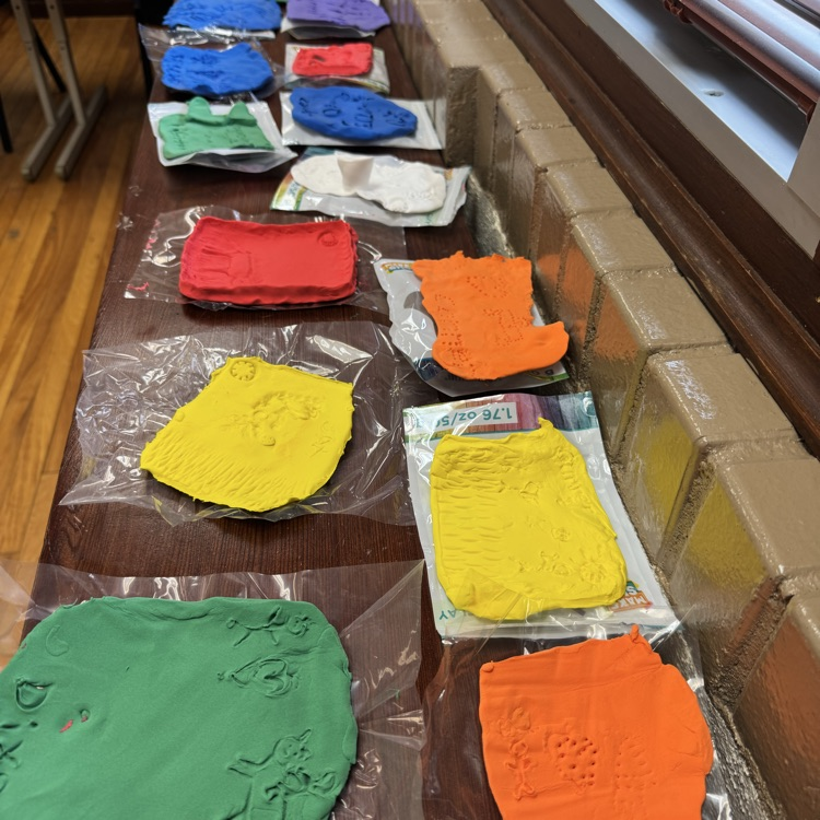After learning about cuneiform in ancient Mesopotamia, 6th grade Social Studies students created their own messages by carving into clay, similar to how the ancient Sumerian scribes once did.