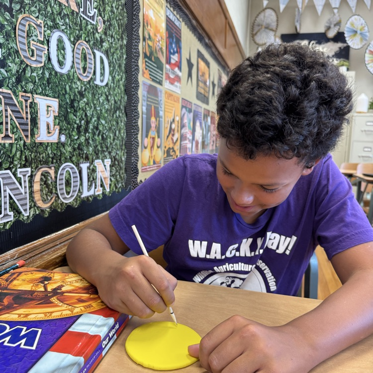 After learning about cuneiform in ancient Mesopotamia, 6th grade Social Studies students created their own messages by carving into clay, similar to how the ancient Sumerian scribes once did.