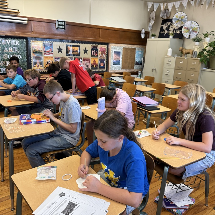 After learning about cuneiform in ancient Mesopotamia, 6th grade Social Studies students created their own messages by carving into clay, similar to how the ancient Sumerian scribes once did.