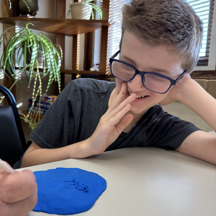 After learning about cuneiform in ancient Mesopotamia, 6th grade Social Studies students created their own messages by carving into clay, similar to how the ancient Sumerian scribes once did.