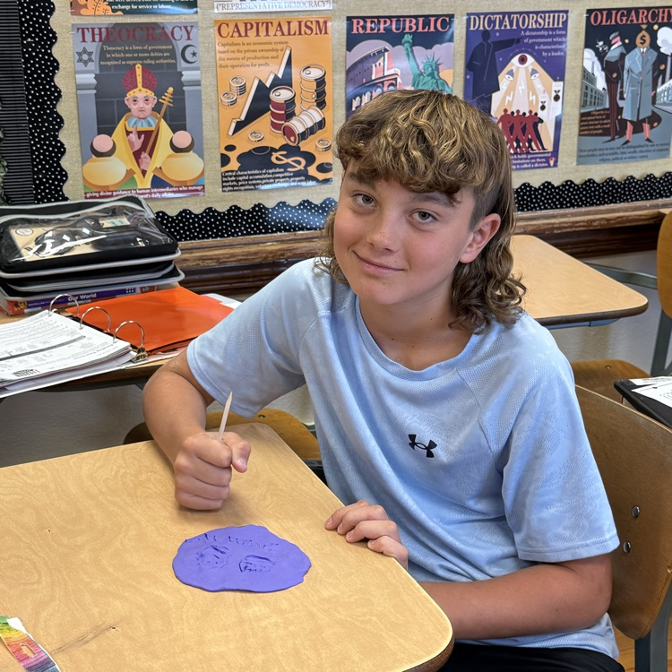 After learning about cuneiform in ancient Mesopotamia, 6th grade Social Studies students created their own messages by carving into clay, similar to how the ancient Sumerian scribes once did.
