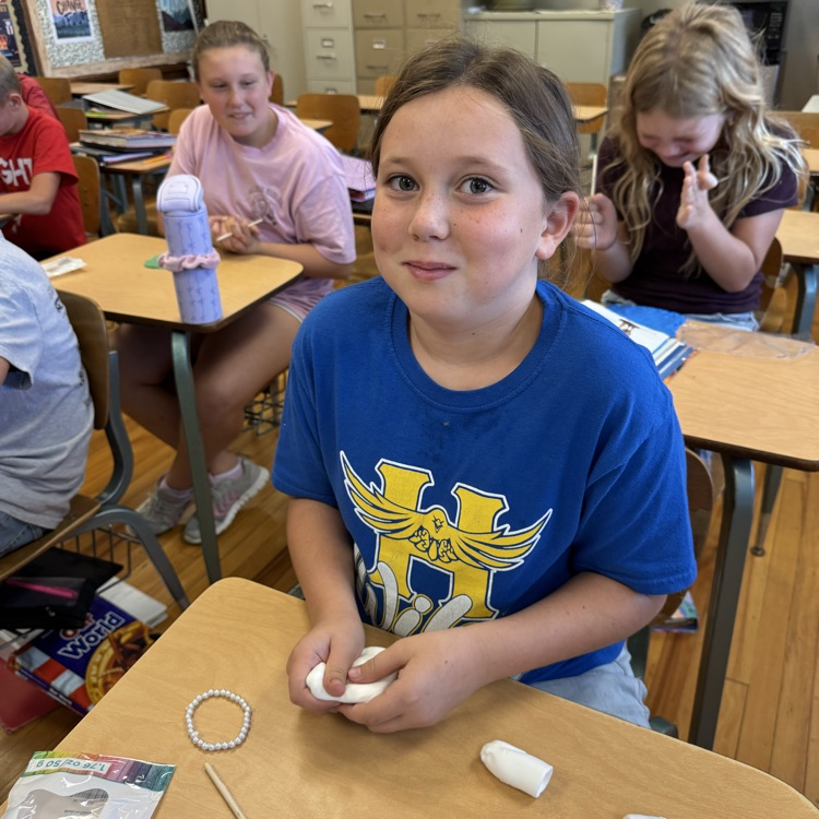 After learning about cuneiform in ancient Mesopotamia, 6th grade Social Studies students created their own messages by carving into clay, similar to how the ancient Sumerian scribes once did.
