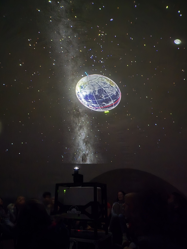 Mrs. Carlin and Mrs. Schultz's kindergarteners enjoying the traveling planetarium. 