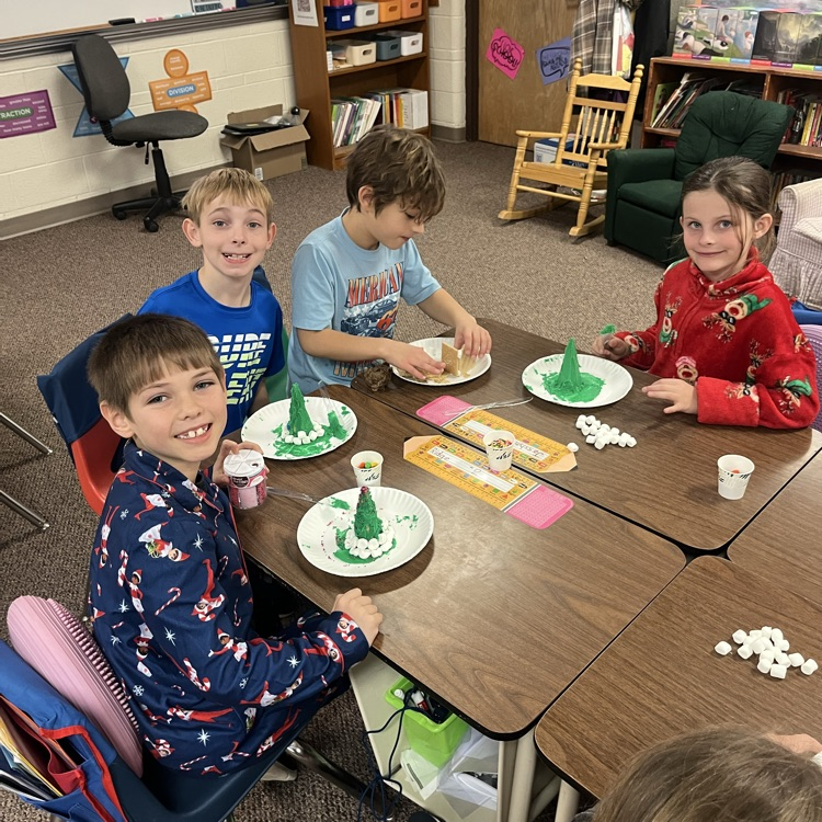 Second grade Christmas fun.  Decorating Christmas trees,  sound wave dancing Christmas trees and at pj party!!  