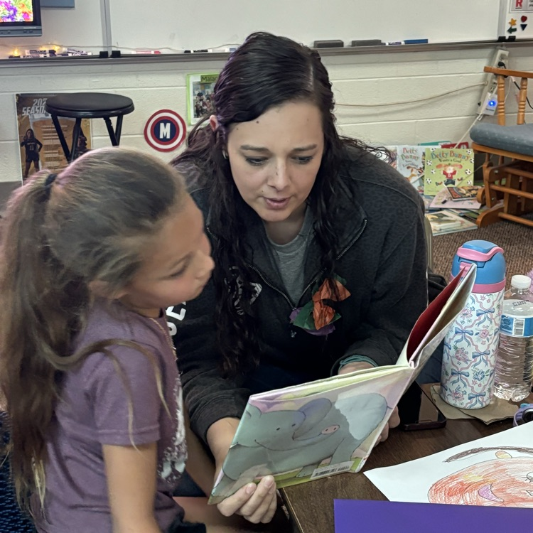 First grade enjoyed Moments with Mom yesterday!