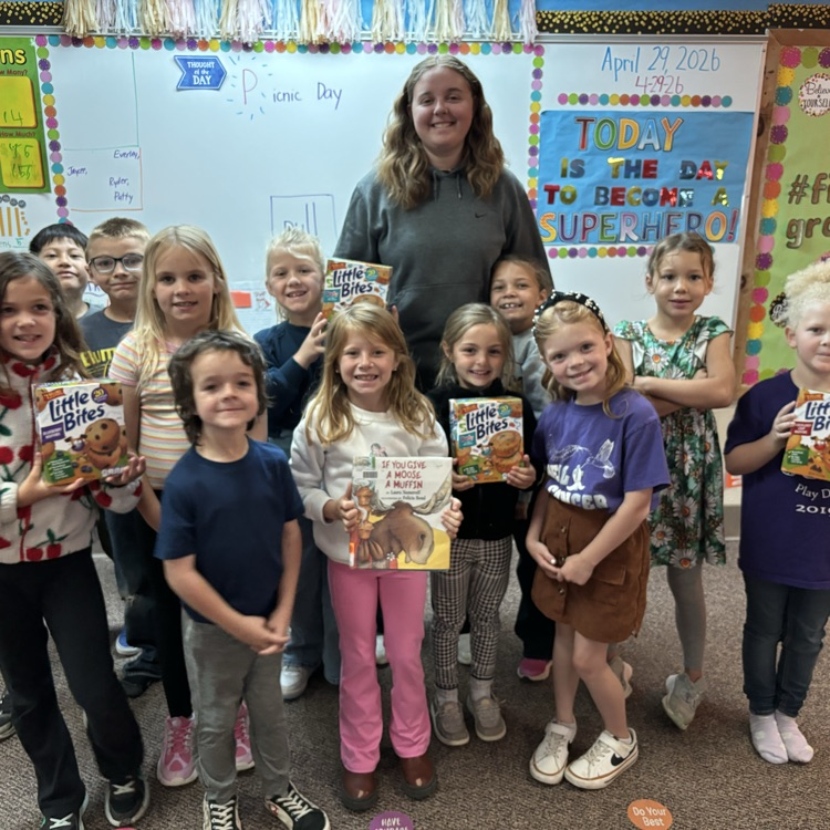 First Grade student aide, Kenley, brought a story and snack for the class as she joined them for “book-nic”!