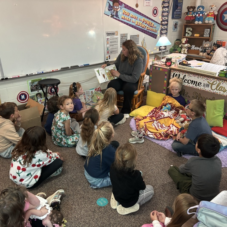 First Grade student aide, Kenley, brought a story and snack for the class as she joined them for “book-nic”!