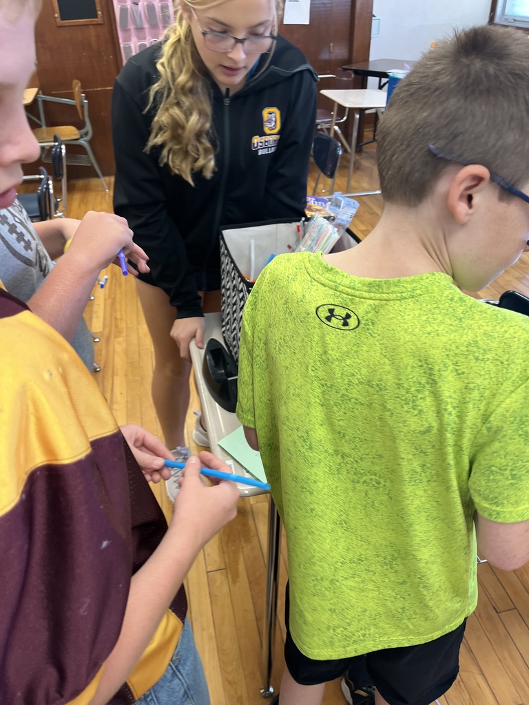 Creating and testing straw rockets!