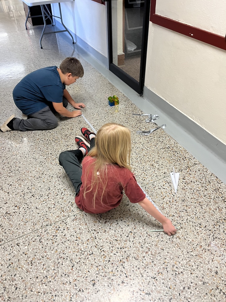 Creating and testing straw rockets!