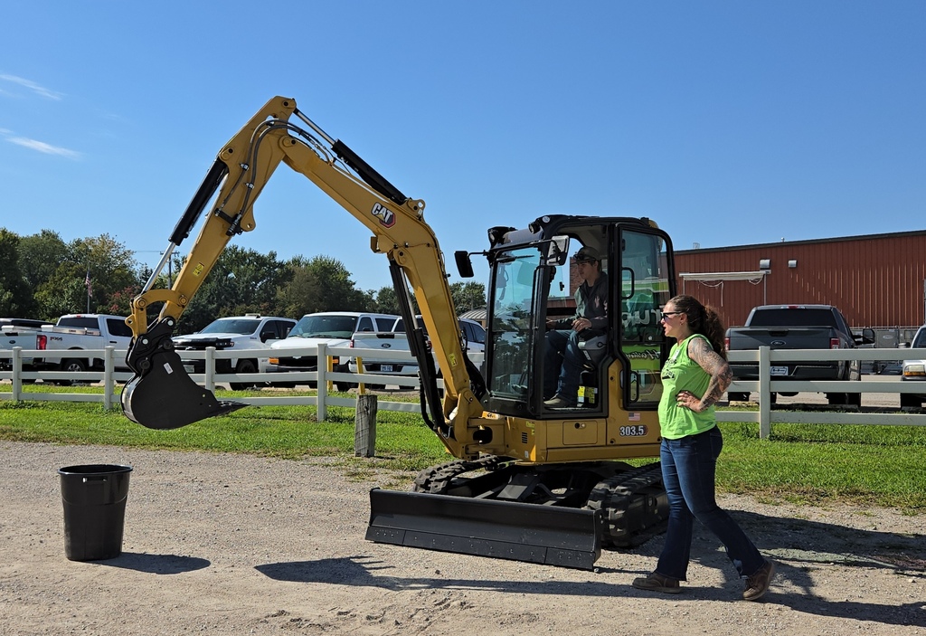 Operating an excavator.