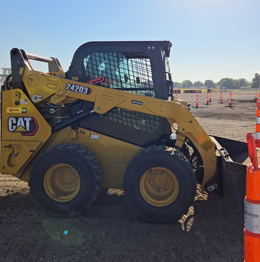 Driving a Bobcat.