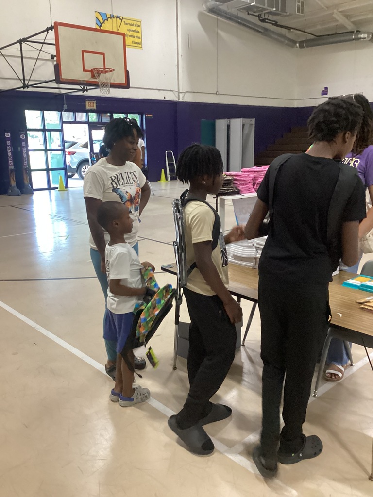 Students getting supplies