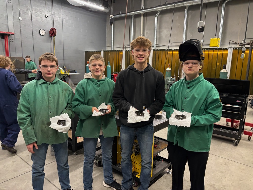 students displaying work