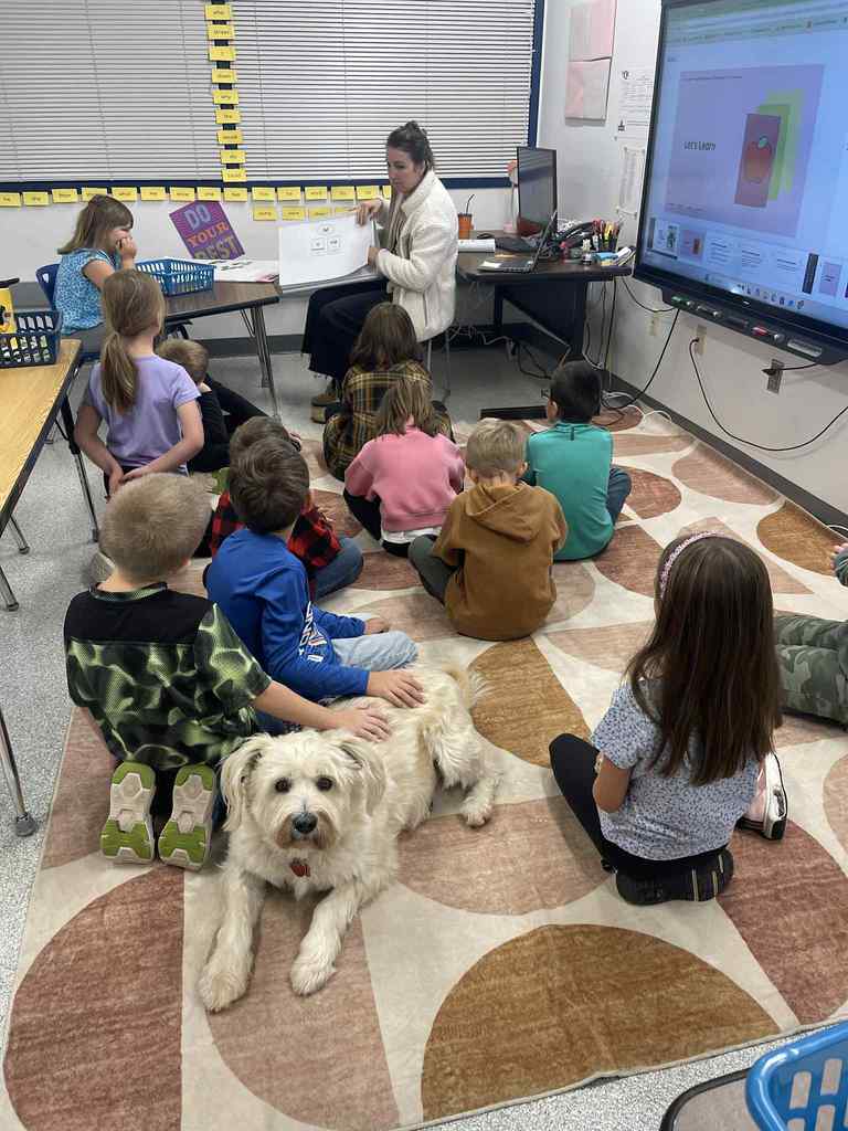 student with clark the dog