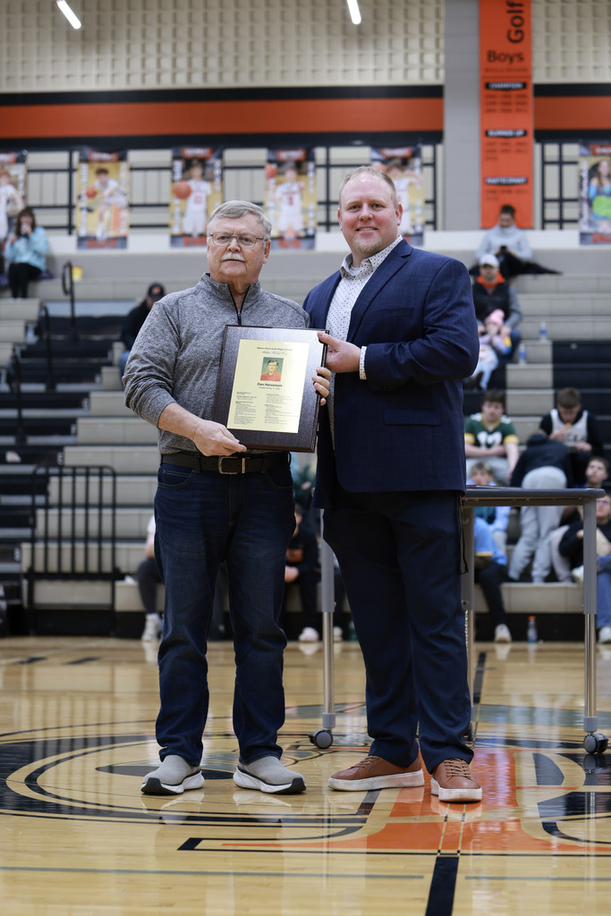 Dan receiving award from Athletic Director