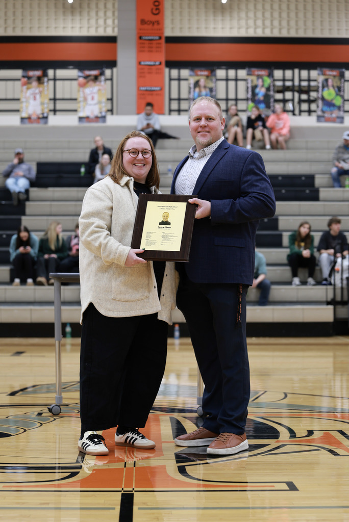 Laura receiving award from A.D.