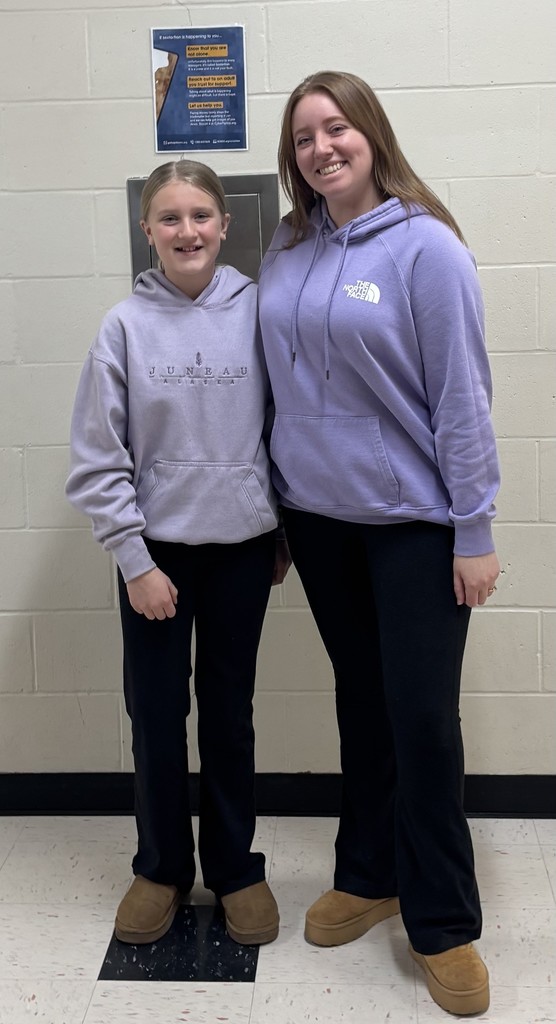 student and teacher dressed alike