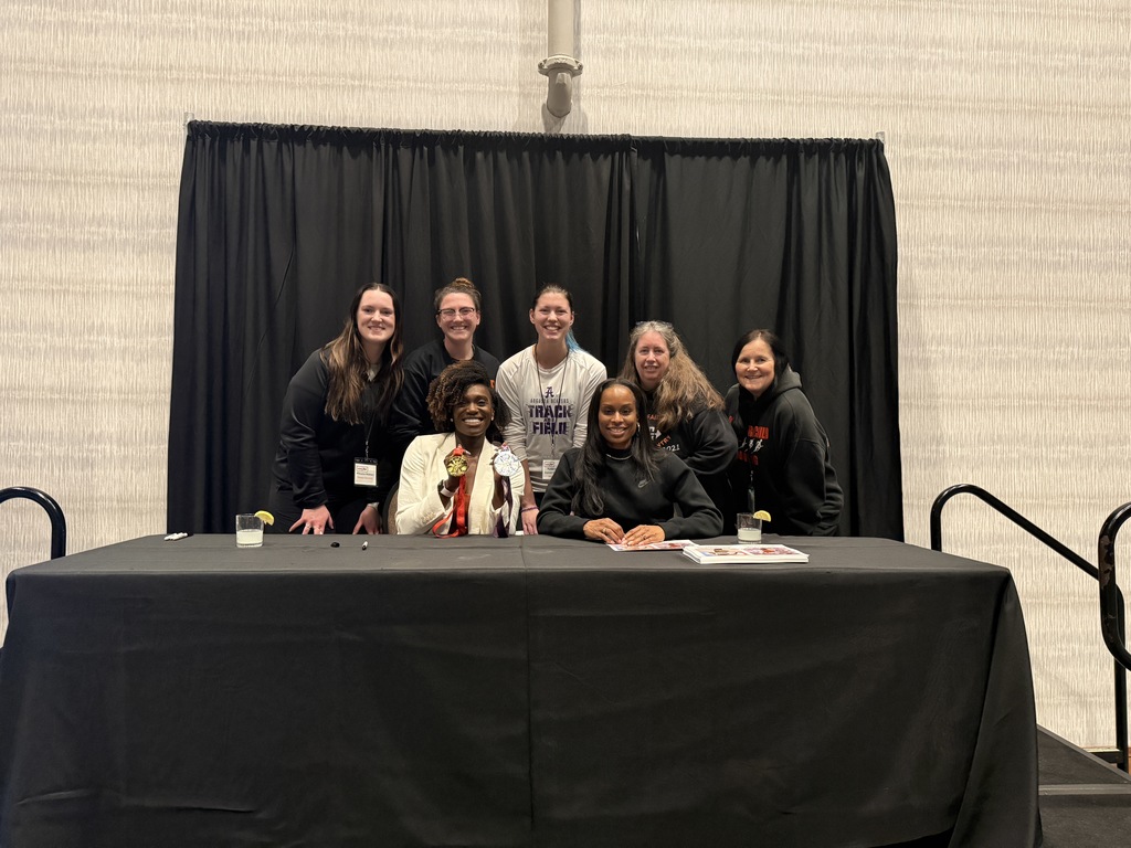 OF Track coaches at conference