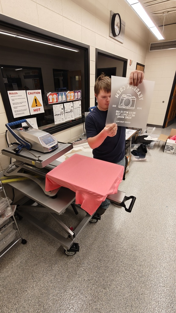 Student making shirts